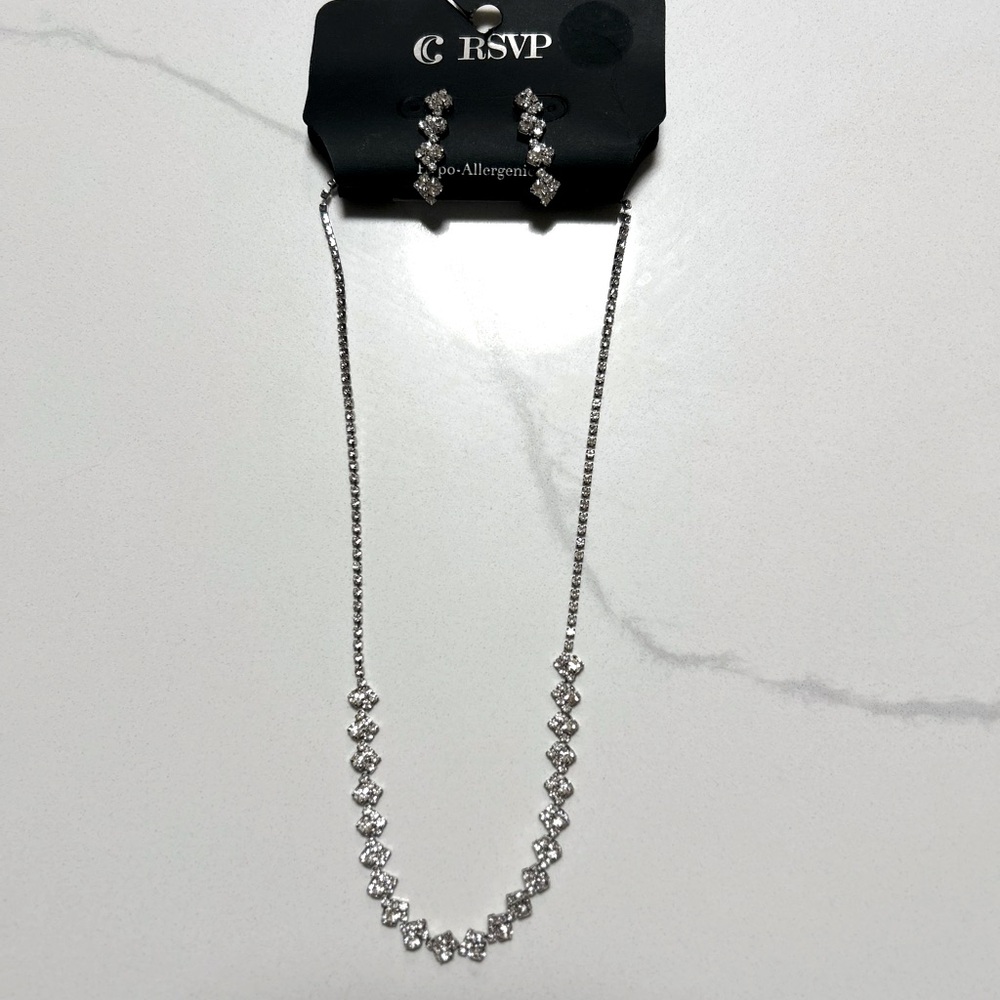 Matching crystal earing and necklace set! Hypoallergenic new with tags!